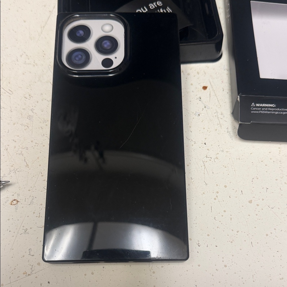 Sleek Black Smartphone with Advanced Camera